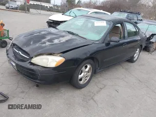 2000 Ford Taurus SE with VIN 1FAFP53U9YA252519, listed as a IAAI auction lot 41247046 with 317,910 mi miles and . Bid and sale history available at DreamBid. Image 2.