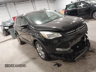 2014 Ford Escape Titanium with VIN 1FMCU9J96EUE26645, listed as a IAAI auction lot 41835893 with 83,730 mi miles. Bid and sale history available at carsss.com. Image 1.