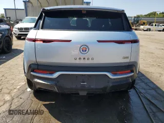 2023 Fisker Ocean One z VIN VCF1ZBU28PG006017, wystawiony jako Copart lot #68742314 z przebiegiem 4598 mil mil oraz Szkody całkowita. Historia ofert i sprzedaży dostępna na DreamBid. Obrazek 6.