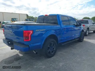 2015 Ford F-150 XL with VIN 1FTEW1CG2FKE28717, listed as a IAAI auction lot 41433414 with 104,752 mi miles. Bid and sale history available at carsss.com. Image 4.