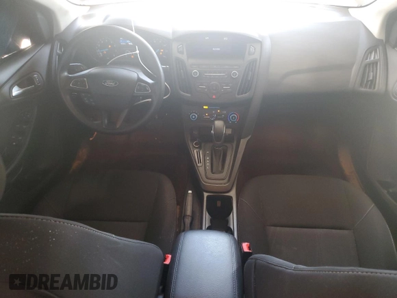 2018 Ford Focus SE z VIN 1FADP3F25JL257815, wystawiony jako Copart lot #61978045 z przebiegiem 62 328 mil mil oraz Szkoda całkowita • Salvage title. Historia ofert i sprzedaży dostępna na DreamBid. Obrazek 8.