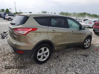 2013 Ford Escape SE with VIN 1FMCU0G95DUA54779, listed as a Copart auction lot 58428065 with 195,284 mi miles and Clean title. Bid and sale history available at DreamBid. Image 3.