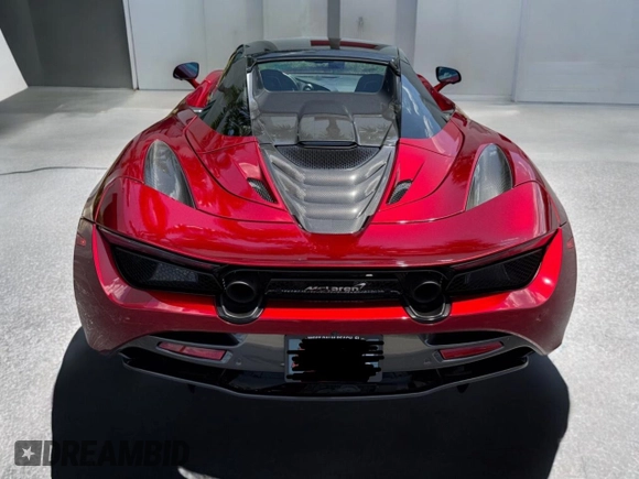 2022 McLaren 720S z VIN SBM14FCA2NW006XXX, wystawiony jako Copart lot #53583055 z przebiegiem 9223 mil mil oraz Tytuł czysty. Historia ofert i sprzedaży dostępna na DreamBid. Obrazek 7.