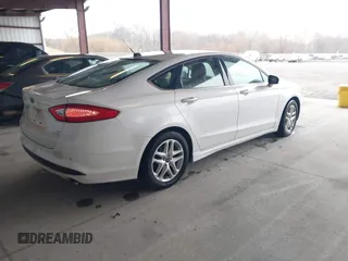 2016 Ford Fusion SE with VIN 1FA6P0HD3G5133027, listed as a IAAI auction lot 41843634 with 112,896 mi miles. Bid and sale history available at carsss.com. Image 4.