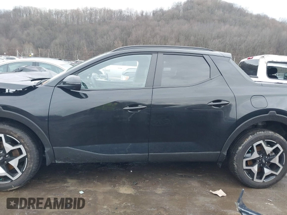 2022 Hyundai Santa Cruz Limited z VIN 5NTJEDAF6NH027151, wystawiony jako IAAI lot #41075036 z przebiegiem 8 611 mil mil oraz . Historia ofert i sprzedaży dostępna na DreamBid. Obrazek 14.