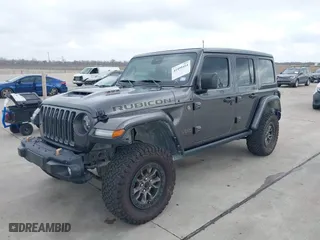 2022 Jeep Wrangler Unlimited Rubicon 392 with VIN 1C4JJXSJXNW102670, listed as a IAAI auction lot 41499424 with 83,168 mi miles. Bid and sale history available at carsss.com. Image 2.