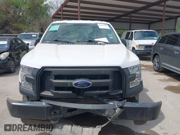 2015 Ford F-150 XL with VIN 1FTMF1E84FKD12758, listed as a IAAI auction lot 41841584 with 59,950 mi miles and . Bid and sale history available at DreamBid. Image 12.