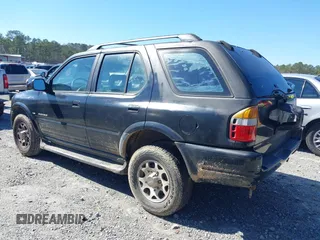 1998 Isuzu Rodeo S z VIN 4S2CK58W2W4315935, wystawiony jako IAAI lot #41593711 z przebiegiem 162 065 mil mil oraz . Historia ofert i sprzedaży dostępna na DreamBid. Obrazek 3.