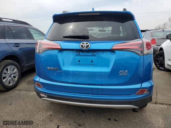 2016 Toyota RAV4 XLE with VIN JTMRFREV3GD182147, listed as a Copart auction lot 52833195 with 69,256 mi miles and Salvage Title. Bid and sale history available at carsss.com. Image 6.