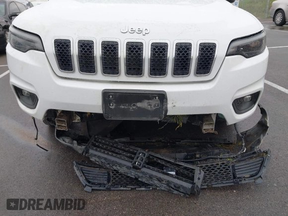 2021 Jeep Cherokee Latitude Lux z VIN 1C4PJMMX4MD221786, wystawiony jako IAAI lot #42432825 z przebiegiem 54 297 mil mil oraz . Historia ofert i sprzedaży dostępna na DreamBid. Obrazek 6.
