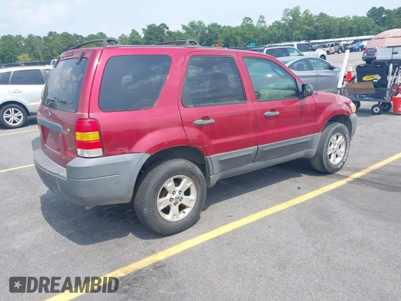 2006 Ford Escape XLT with VIN 1FMYU03136KD09448, listed as a IAAI auction lot 42578120 with 235,521 mi miles and . Bid and sale history available at DreamBid. Image 4.