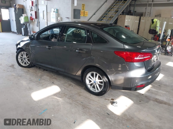 2017 Ford Focus SE with VIN 1FADP3F29HL220440, listed as a IAAI auction lot 41975013 with 40,295 mi miles and . Bid and sale history available at DreamBid. Image 3.