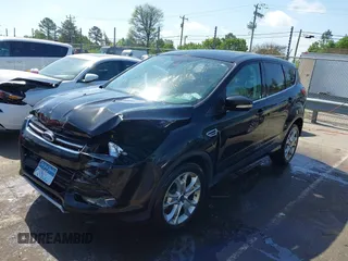 2013 Ford Escape SEL with VIN 1FMCU9H94DUA10002, listed as a IAAI auction lot 41963247 with 85,941 mi miles. Bid and sale history available at carsss.com. Image 2.