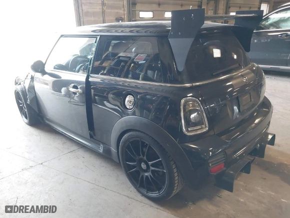 2008 MINI Cooper Hardtop S with VIN WMWMF73568TT87273, listed as a IAAI auction lot 41996859 with 107,671 mi miles. Bid and sale history available at carsss.com. Image 3.