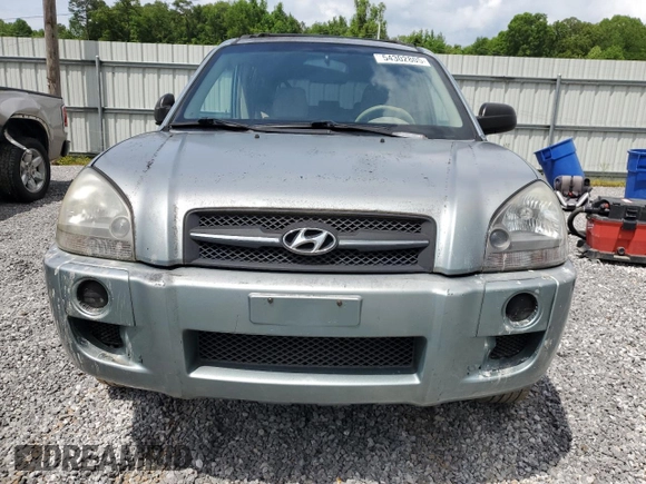 2005 Hyundai Tucson GL with VIN KM8JM12B05U148660, listed as a Copart auction lot 54302805 with 257,233 mi miles and Salvage title. Bid and sale history available at DreamBid. Image 5.