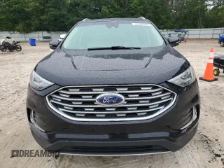 2019 Ford Edge SEL z VIN 2FMPK4J9XKBB10418, wystawiony jako Copart lot #58368335 z przebiegiem 97 458 mil mil oraz Czysty tytuł • Clean title. Historia ofert i sprzedaży dostępna na DreamBid. Obrazek 5.
