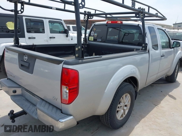 2014 Nissan Frontier SV with VIN 1N6AD0CUXEN768602, listed as a IAAI auction lot 42074514 with 77,469 mi miles and . Bid and sale history available at DreamBid. Image 4.