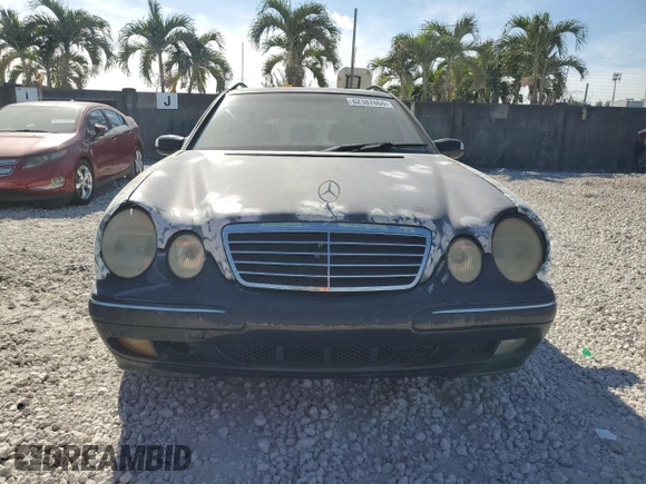2001 Mercedes-Benz E-Class AWD with VIN WDBJH82J91X053532, listed as a Copart auction lot 82387664 with 116,737 mi miles and Salvage Title. Bid and sale history available at carsss.com. Image 5.