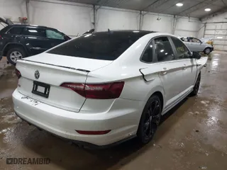 2020 Volkswagen Jetta GLI S with VIN 3VW6T7BUXLM039056, listed as a IAAI auction lot 41543631 with 63,173 mi miles. Bid and sale history available at carsss.com. Image 4.