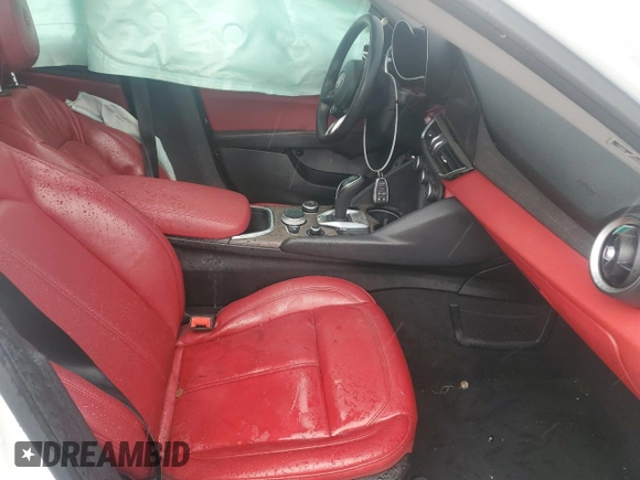 2021 Alfa Romeo Giulia Ti z VIN ZARFANBN1M7648754, wystawiony jako Copart lot #55331525 z przebiegiem Nie podano mil oraz Szkoda całkowita • Salvage title. Historia ofert i sprzedaży dostępna na DreamBid. Obrazek 7.