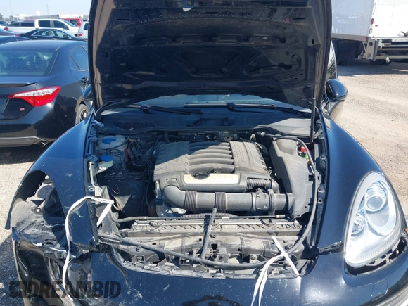 2014 Porsche Cayenne with VIN WP1AA2A21ELA92673, listed as a IAAI auction lot 41597732 with 140,673 mi miles and . Bid and sale history available at DreamBid. Image 10.