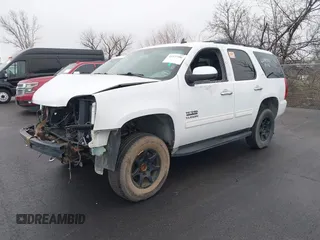 2011 GMC Yukon SLT with VIN 1GKS1CE01BR101311, listed as a IAAI auction lot 41572486 with 1 mi miles. Bid and sale history available at carsss.com. Image 2.