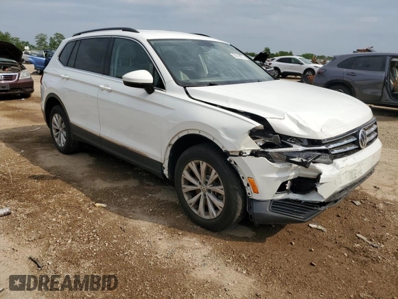 2018 Volkswagen Tiguan SEL with VIN 3VV2B7AX5JM161449, listed as a Copart auction lot 59318875 with 73,343 mi miles and Salvage title. Bid and sale history available at DreamBid. Image 4.