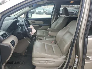 2012 Honda Odyssey Touring with VIN 5FNRL5H9XCB078399, listed as a Copart auction lot 52360165 with 174,819 mi miles and Salvage Title. Bid and sale history available at DreamBid. Image 7.