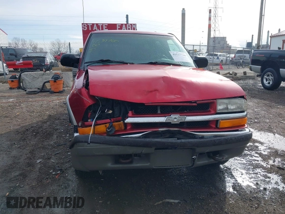 2000 Chevrolet Blazer LT z VIN 1GNDT13W2Y2163805, wystawiony jako IAAI lot #41537780 z przebiegiem 170 527 mil mil oraz . Historia ofert i sprzedaży dostępna na DreamBid. Obrazek 12.
