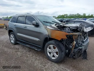 2011 Jeep Grand Cherokee Laredo with VIN 1J4RR4GG3BC718953, listed as a IAAI auction lot 39421353 with 1 mi miles. Bid and sale history available at carsss.com. Image 1.