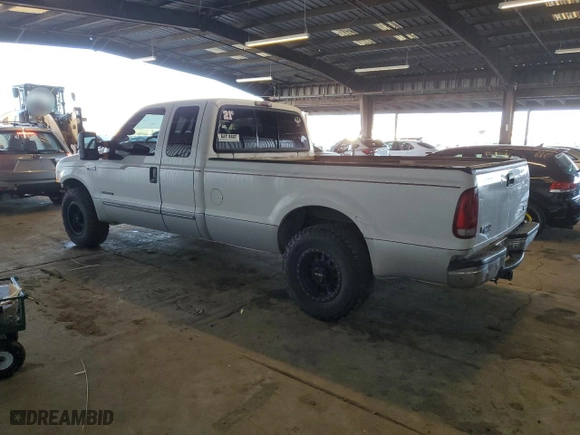 1999 Ford Super Duty F-250 XL with VIN 1FTNX20F0XEE02454, listed as a Copart auction lot 84049154 with 227,005 mi miles and Salvage Title. Bid and sale history available at carsss.com. Image 2.