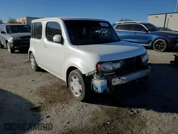 2014 Nissan Cube SL z VIN JN8AZ2KR3ET352338, wystawiony jako Copart lot #41538795 z przebiegiem 131 668 mil mil oraz Szkoda całkowita • Salvage title. Historia ofert i sprzedaży dostępna na DreamBid. Obrazek 11.