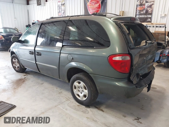 2003 Dodge Caravan SE with VIN 1D4GP24313B191319, listed as a IAAI auction lot 41398477 with 220,083 mi miles. Bid and sale history available at carsss.com. Image 3.