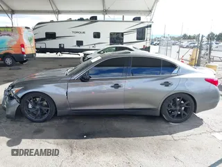 2015 Infiniti Q50 Premium with VIN JN1BV7AP1FM330183, listed as a IAAI auction lot 41788224 with 139,818 mi miles. Bid and sale history available at carsss.com. Image 14.