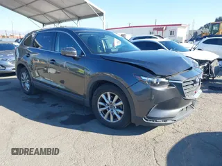 2017 Mazda CX-9 Sport with VIN JM3TCABY4H0128483, listed as a IAAI auction lot 41299667 with 142,343 mi miles and . Bid and sale history available at carsss.com. Image 1.