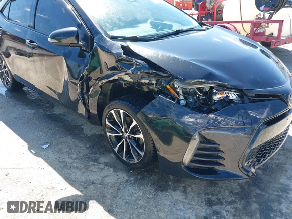 2019 Toyota Corolla L z VIN 5YFBURHE2KP897493, wystawiony jako IAAI lot #42052106 z przebiegiem 100 303 mil mil oraz . Historia ofert i sprzedaży dostępna na DreamBid. Obrazek 6.