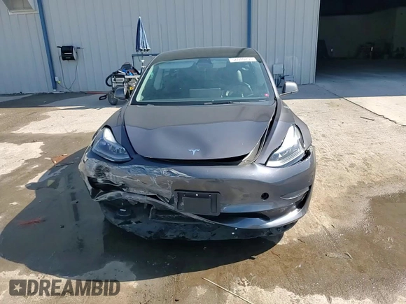 2023 Tesla Model 3 with VIN 5YJ3E1EA7PF456613, listed as a Copart auction lot 56940255 with 35,920 mi miles and Non repairable. Bid and sale history available at DreamBid. Image 13.