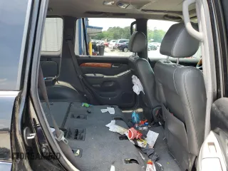 2006 Lexus GX 470 z VIN JTJBT20X660101641, wystawiony jako Copart lot #57242995 z przebiegiem 219 032 mil mil oraz Szkoda całkowita • Salvage title. Historia ofert i sprzedaży dostępna na DreamBid. Obrazek 11.