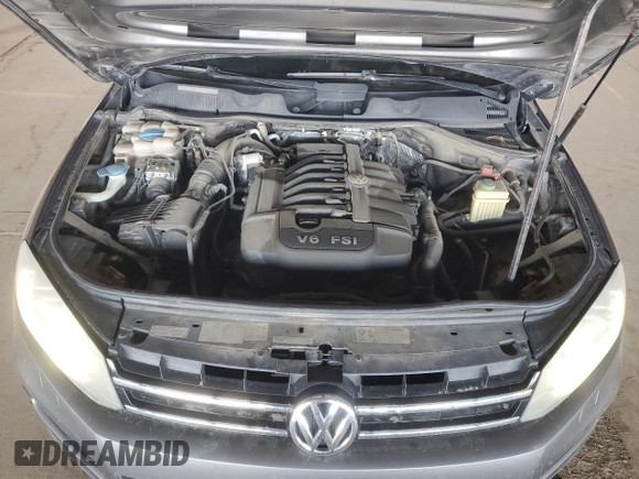 2013 Volkswagen Touareg Lux с VIN WVGEF9BP9DD003735, выставлен на аукционе Copart как лот 58852315 с пробегом 138 223 миль миль и Списание • Salvage title. История ставок и продаж доступна на DreamBid. Изображение 11.