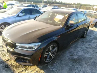 2017 BMW 7 Series 750i with VIN WBA7F0C35HGM22087, listed as a IAAI auction lot 40872348 with 49,734 mi miles. Bid and sale history available at carsss.com. Image 2.