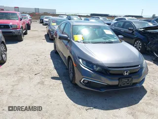 2019 Honda Civic EX-L z VIN 19XFC1F70KE205694, wystawiony jako IAAI lot #41976645 z przebiegiem 43 653 mil mil oraz . Historia ofert i sprzedaży dostępna na DreamBid. Obrazek 1.