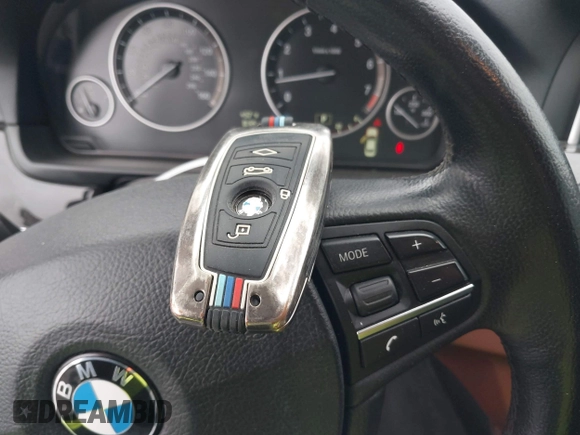 2014 BMW 5 Series 535i with VIN WBA5B1C57ED475963, listed as a IAAI auction lot 41914997 with 92,037 mi miles and . Bid and sale history available at DreamBid. Image 11.