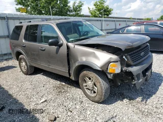2003 Ford Explorer XLS with VIN 1FMZU72K43UB12036, listed as a Copart auction lot 61124985 with 210,901 mi miles and Salvage title. Bid and sale history available at DreamBid. Image 4.