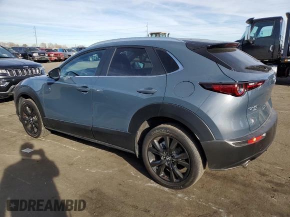 2023 Mazda CX-30 S Carbon Edition z VIN 3MVDMBCM5PM512410, wystawiony jako Copart lot #83490034 z przebiegiem 23 783 mil mil oraz Nie do naprawy • Non repairable. Historia ofert i sprzedaży dostępna na DreamBid. Obrazek 2.