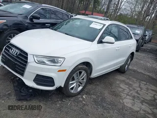 2017 Audi Q3 Premium z VIN WA1BCCFS2HR009908, wystawiony jako IAAI lot #41867249 z przebiegiem 116 804 mil mil oraz . Historia ofert i sprzedaży dostępna na DreamBid. Obrazek 16.