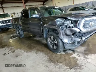 2019 Toyota Tacoma SR z VIN 3TMCZ5AN8KM197011, wystawiony jako Copart lot #56198675 z przebiegiem 117 363 mil mil oraz Szkoda całkowita • Salvage title. Historia ofert i sprzedaży dostępna na DreamBid. Obrazek 14.