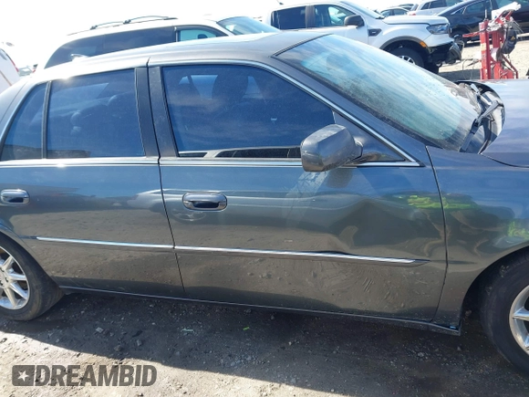 2011 Cadillac DTS Premium Collection z VIN 1G6KH5E68BU124852, wystawiony jako IAAI lot #41652793 z przebiegiem 227 148 mil mil oraz . Historia ofert i sprzedaży dostępna na DreamBid. Obrazek 14.