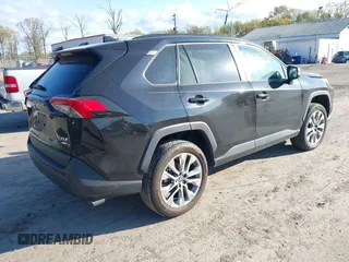 2022 Toyota RAV4 XLE Premium with VIN 2T3A1RFV6NC283890, listed as a IAAI auction lot 42045390 with 69,180 mi miles and . Bid and sale history available at DreamBid. Image 4.