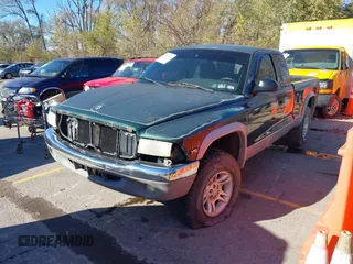 1998 Dodge Dakota SLT with VIN 1B7GG22X3WS573262, listed as a IAAI auction lot 40905093 with 148,684 mi miles and . Bid and sale history available at DreamBid. Image 2.