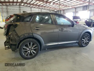 2017 Mazda CX-3 Grand Touring z VIN JM1DKFD74H0163736, wystawiony jako Copart lot #57871265 z przebiegiem 212 515 mil mil oraz Szkody całkowita. Historia ofert i sprzedaży dostępna na DreamBid. Obrazek 3.